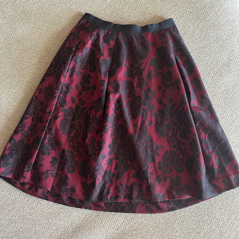 White House Black Market midi red and black lace detail skirt. Size 0